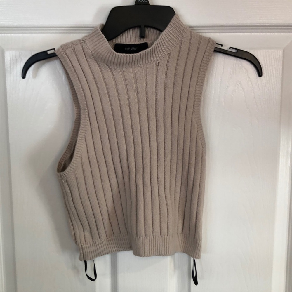 Knitted crop/ halter top with a mock turtle neck